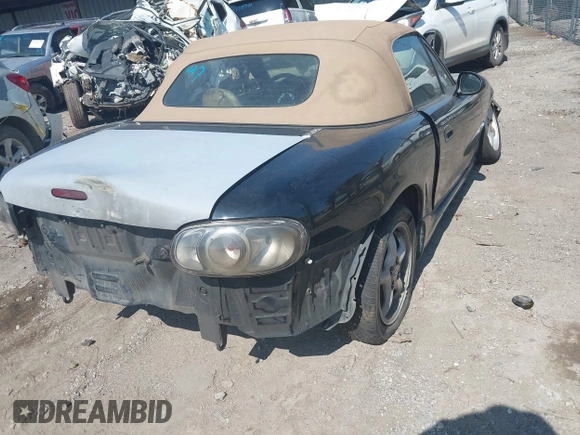 1999 Mazda MX-5 Miata with VIN JM1NB3539X0112181, listed as a IAAI auction lot 42397232 with 11 mi miles and . Bid and sale history available at DreamBid. Image 4.