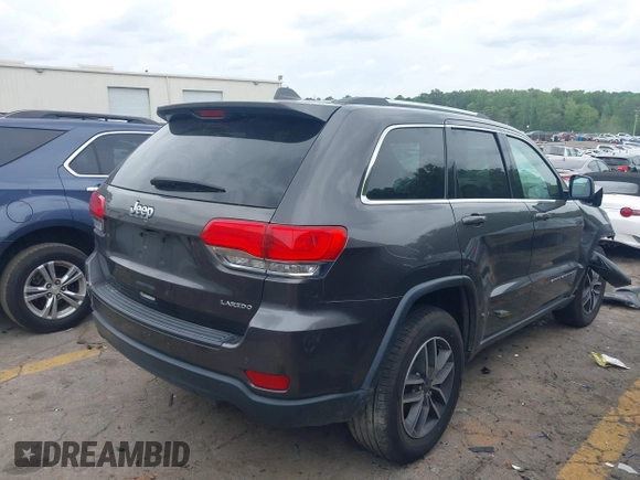 2019 Jeep Grand Cherokee Altitude with VIN 1C4RJEAG7KC556191, listed as a IAAI auction lot 42160524 with 96,373 mi miles and . Bid and sale history available at DreamBid. Image 4.