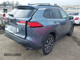2022 Toyota Corolla Cross XLE with VIN 7MUDAABG6NV007009, listed as a IAAI auction lot 42409061 with 37,178 mi miles and . Bid and sale history available at DreamBid. Image 4.