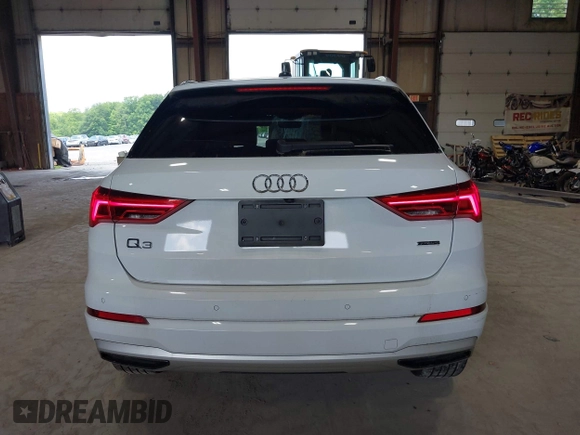 2020 Audi Q3 Premium with VIN WA1AECF3XL1090825, listed as a IAAI auction lot 42541577 with 32,432 mi miles and . Bid and sale history available at DreamBid. Image 16.