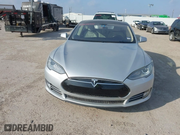 2013 Tesla Model S with VIN 5YJSA1CG3DFP28908, listed as a IAAI auction lot 41804041 with 140,756 mi miles and . Bid and sale history available at DreamBid. Image 6.