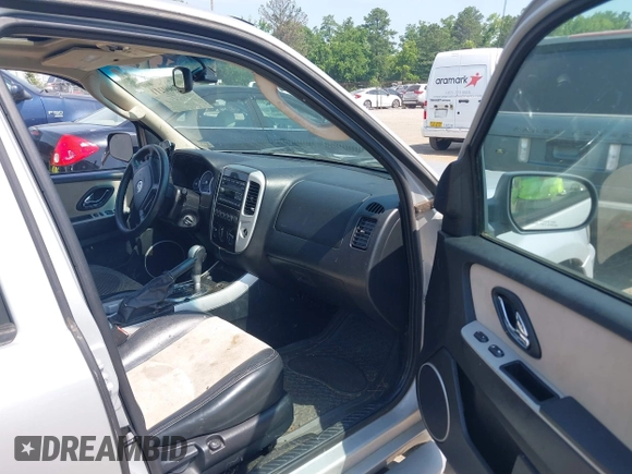 2006 Mercury Mariner Luxury с VIN 4M2CU57106DJ03167, выставлен на аукционе IAAI как лот 42600111 с пробегом 273 239 миль миль и . История ставок и продаж доступна на DreamBid. Изображение 5.