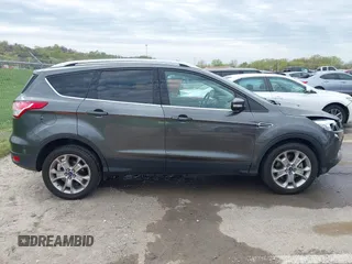 2015 Ford Escape Titanium with VIN 1FMCU0J90FUA25086, listed as a IAAI auction lot 41993681 with 126,170 mi miles. Bid and sale history available at carsss.com. Image 13.