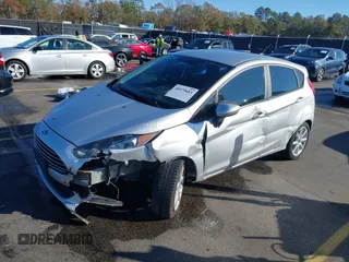 2019 Ford Fiesta SE with VIN 3FADP4EJ0KM107058, listed as a IAAI auction lot 40979683 with 116,854 mi miles. Bid and sale history available at carsss.com. Image 17.