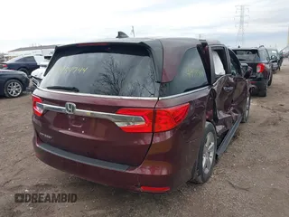 2018 Honda Odyssey EX-L z VIN 5FNRL6H71JB072363, wystawiony jako IAAI lot #41954744 z przebiegiem 104 820 mil mil oraz . Historia ofert i sprzedaży dostępna na DreamBid. Obrazek 4.
