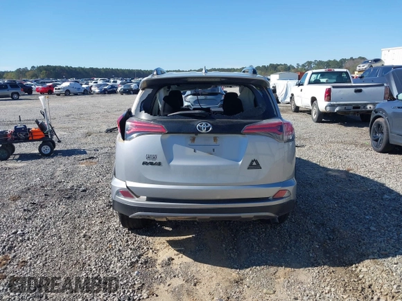 2018 Toyota RAV4 XLE with VIN 2T3RFREVXJW748993, listed as a IAAI auction lot 41878888 with 111,760 mi miles and . Bid and sale history available at DreamBid. Image 16.