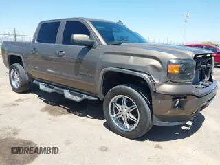 2015 GMC Sierra 1500 SLE z VIN 3GTP1UEC3FG379456, wystawiony jako IAAI lot #42052803 z przebiegiem 105 049 mil mil oraz . Historia ofert i sprzedaży dostępna na DreamBid. Obrazek 1.