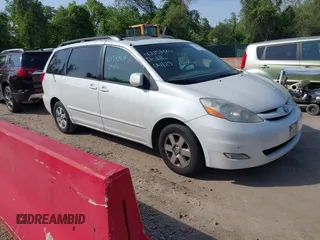 2009 Toyota Sienna XLE with VIN 5TDZK22C19S262107, listed as a IAAI auction lot 42158864 with 186,711 mi miles. Bid and sale history available at carsss.com. Image 1.