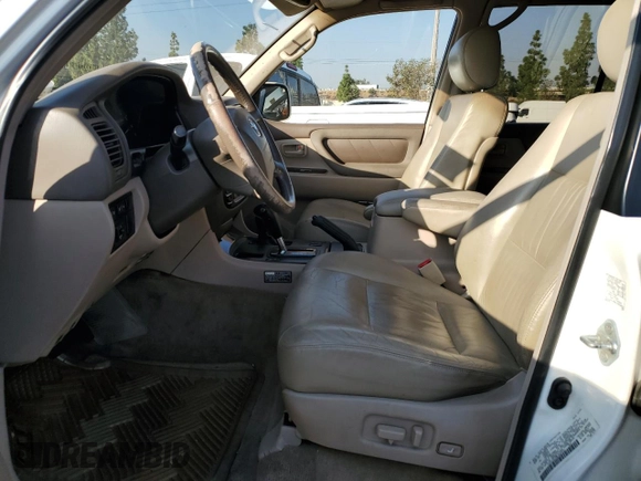 2002 Toyota Land Cruiser z VIN JTEHT05J022020635, wystawiony jako Copart lot #80284764 z przebiegiem Nie podano mil oraz Szkoda całkowita • Salvage title. Historia ofert i sprzedaży dostępna na DreamBid. Obrazek 7.