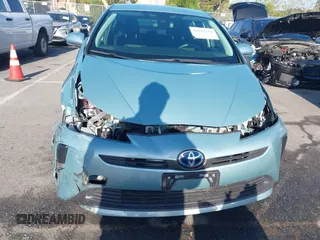 2022 Toyota Prius L Eco with VIN JTDKAMFU8N3188831, listed as a IAAI auction lot 42021222 with 39,629 mi miles and . Bid and sale history available at DreamBid. Image 13.