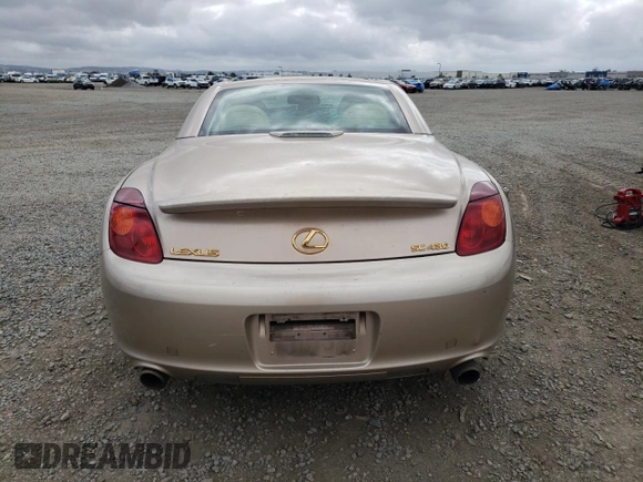 2002 Lexus SC 430 with VIN JTHFN48Y320010682, listed as a Copart auction lot 60476285 with 198,630 mi miles and Salvage title. Bid and sale history available at DreamBid. Image 6.