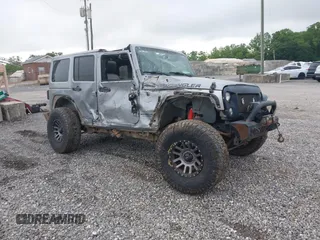 2015 Jeep Wrangler Unlimited Sahara with VIN 1C4BJWEGXFL646961, listed as a IAAI auction lot 42361275 with 186,558 mi miles and . Bid and sale history available at DreamBid. Image 1.