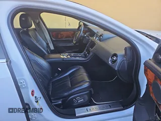 2013 Jaguar XJ с VIN SAJWJ1CD7D8V49599, выставлен на аукционе Copart как лот 43230675 с пробегом 133 163 миль миль и Чистый • Clean title. История ставок и продаж доступна на DreamBid. Изображение 5.