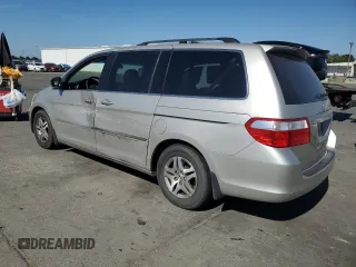 2005 Honda Odyssey EX-L z VIN 5FNRL386X5B407129, wystawiony jako Copart lot #56366655 z przebiegiem 181 893 mil mil oraz Szkoda całkowita • Salvage title. Historia ofert i sprzedaży dostępna na DreamBid. Obrazek 2.