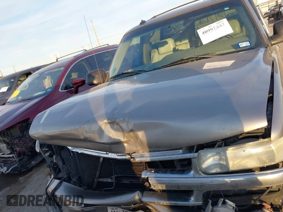 2003 Chevrolet Suburban LT z VIN 3GNEC16Z03G317762, wystawiony jako IAAI lot #40997537 z przebiegiem Nie podano mil oraz . Historia ofert i sprzedaży dostępna na DreamBid. Obrazek 12.