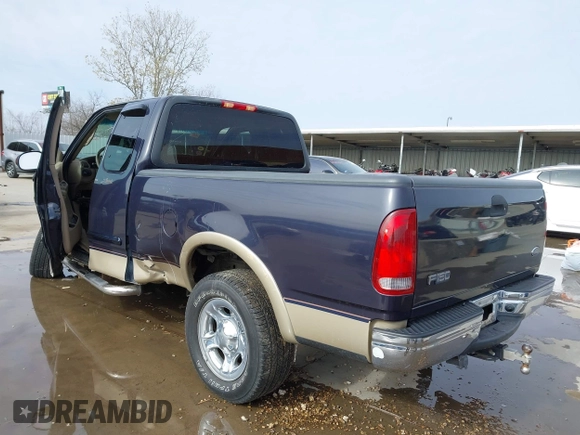 2000 Ford F-150 XL with VIN 1FTRX17L2YNB85627, listed as a IAAI auction lot 41377814 with 123,740 mi miles. Bid and sale history available at carsss.com. Image 3.