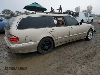 2001 Mercedes-Benz E-Class with VIN WDBJH65J71B230219, listed as a Copart auction lot 44334175 with 147,331 mi miles and Salvage Title. Bid and sale history available at carsss.com. Image 3.
