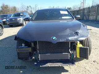 2021 BMW 5 Series 540i xDrive with VIN WBA73BJ0XMWX01449, listed as a IAAI auction lot 41630703 with 65,212 mi miles and . Bid and sale history available at DreamBid. Image 13.