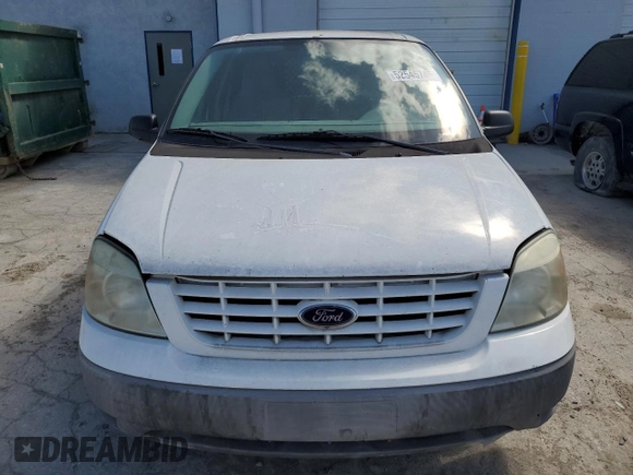 2007 Ford Freestar Cargo z VIN 2FTZA54647BA13617, wystawiony jako Copart lot #52545745 z przebiegiem Nie podano mil oraz Szkody całkowita. Historia ofert i sprzedaży dostępna na DreamBid. Obrazek 5.