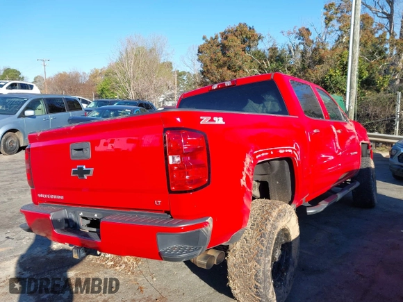 2018 Chevrolet Silverado 1500 LT with VIN 3GCUKREC7JG359913, listed as a IAAI auction lot 41848404 with 125,377 mi miles. Bid and sale history available at carsss.com. Image 4.