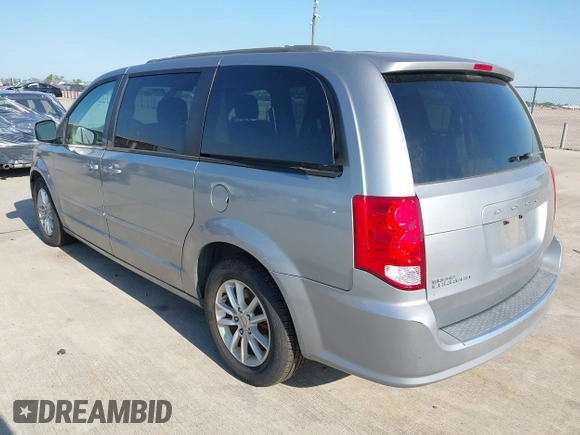 2014 Dodge Grand Caravan SXT z VIN 2C4RDGCG4ER244762, wystawiony jako IAAI lot #42002269 z przebiegiem 117 896 mil mil oraz . Historia ofert i sprzedaży dostępna na DreamBid. Obrazek 3.