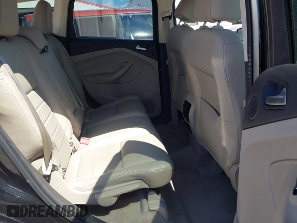 2015 Ford Escape Titanium with VIN 1FMCU0J91FUB36973, listed as a IAAI auction lot 41889560 with 93,445 mi miles and . Bid and sale history available at DreamBid. Image 8.