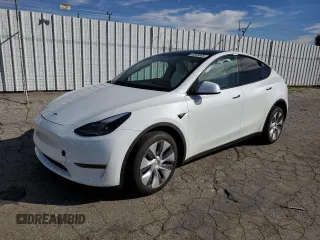 2024 Tesla Model Y Long Range z VIN 7SAYGDEE6RA250657, wystawiony jako Copart lot #45598905 z przebiegiem 24 809 mil mil oraz Szkoda całkowita • Salvage title. Historia ofert i sprzedaży dostępna na DreamBid. Obrazek 1.