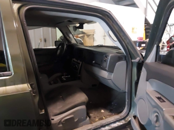 2007 Jeep Commander Sport z VIN 1J8HG48P17C545682, wystawiony jako IAAI lot #41369706 z przebiegiem 187 900 mil mil oraz . Historia ofert i sprzedaży dostępna na DreamBid. Obrazek 5.