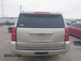 2015 Chevrolet Suburban LT with VIN 1GNSCJKC4FR744208, listed as a IAAI auction lot 41612915 with 87,445 mi miles and . Bid and sale history available at DreamBid. Image 16.