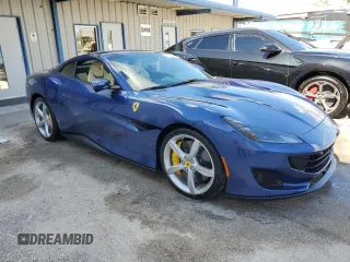 2019 Ferrari Portofino z VIN ZFF89FPAXK0242549, wystawiony jako Copart lot #74454234 z przebiegiem Nie podano mil oraz Nie do naprawy. Historia ofert i sprzedaży dostępna na DreamBid. Obrazek 4.