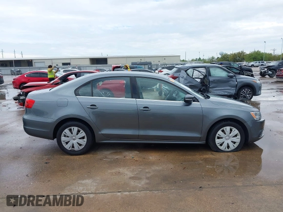 2013 Volkswagen Jetta SE with VIN 3VWDX7AJ9DM371414, listed as a IAAI auction lot 41861196 with 156,169 mi miles and . Bid and sale history available at DreamBid. Image 14.