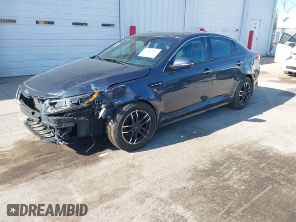 2015 Kia Optima LX with VIN 5XXGM4A77FG381505, listed as a IAAI auction lot 42105568 with 164,641 mi miles and . Bid and sale history available at DreamBid. Image 18.