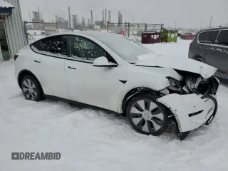 2022 Tesla Model Y Long Range with VIN 7SAYGDEE4NF433617, listed as a Copart auction lot 42585975 with 93,949 mi miles and Salvage Title. Bid and sale history available at carsss.com. Image 4.