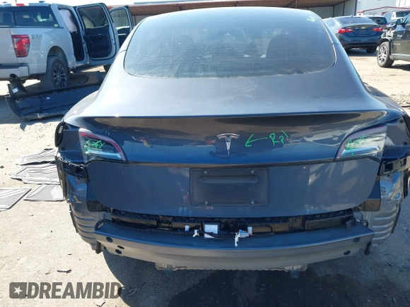 2022 Tesla Model 3 with VIN 5YJ3E1EAXNF326354, listed as a IAAI auction lot 41651872 with 27,922 mi miles and . Bid and sale history available at DreamBid. Image 17.