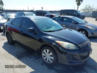 2013 Mazda Mazda3 i Sport with VIN JM1BL1U7XD1702243, listed as a IAAI auction lot 42001182 with 115,257 mi miles. Bid and sale history available at carsss.com. Image 1.