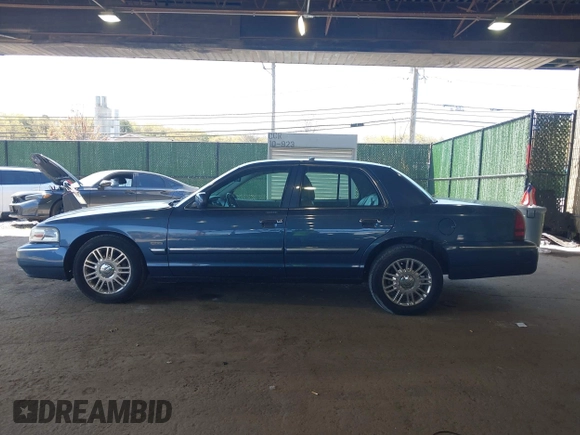 2011 Mercury Grand Marquis LS with VIN 2MEBM7FV7BX604379, listed as a IAAI auction lot 42134407 with 55,151 mi miles and . Bid and sale history available at DreamBid. Image 14.