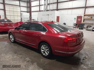 2016 Volkswagen Passat 1.8T S with VIN 1VWAS7A39GC013979, listed as a IAAI auction lot 41533003 with 162,746 mi miles. Bid and sale history available at carsss.com. Image 3.