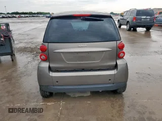 2009 Smart fortwo Pure z VIN WMEEJ31X49K233947, wystawiony jako Copart lot #60535065 z przebiegiem 48 669 mil mil oraz Czysty tytuł • Clean title. Historia ofert i sprzedaży dostępna na DreamBid. Obrazek 6.