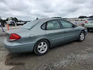 2006 Ford Taurus SE z VIN 1FAFP53U16A142612, wystawiony jako Copart lot #59805145 z przebiegiem 116 999 mil mil oraz Czysty tytuł • Clean title. Historia ofert i sprzedaży dostępna na DreamBid. Obrazek 3.