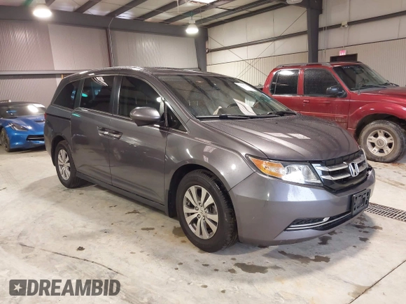 2015 Honda Odyssey EX-L with VIN 5FNRL5H65FB126479, listed as a IAAI auction lot 38993955 with 196,199 mi miles and . Bid and sale history available at carsss.com. Image 1.