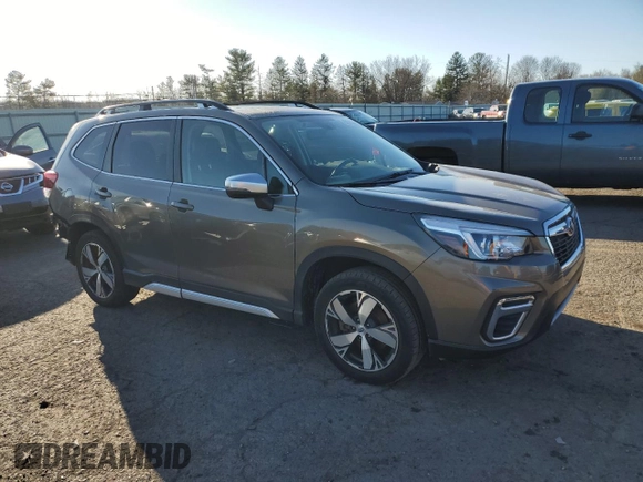 2020 Subaru Forester Touring with VIN JF2SKAXC7LH414585, listed as a Copart auction lot 50732475 with 98,412 mi miles and Salvage Title. Bid and sale history available at carsss.com. Image 4.