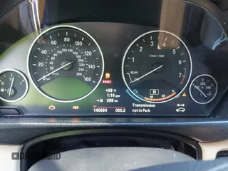 2014 BMW 3 Series 328i xDrive with VIN WBA3B3C55EJ979836, listed as a IAAI auction lot 41886624 with 140,684 mi miles. Bid and sale history available at carsss.com. Image 7.