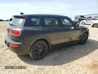 2016 MINI Clubman z VIN WMWLN5C50G2E29737, wystawiony jako Copart lot #50459135 z przebiegiem 129 940 mil mil oraz Szkody całkowita. Historia ofert i sprzedaży dostępna na DreamBid. Obrazek 3.