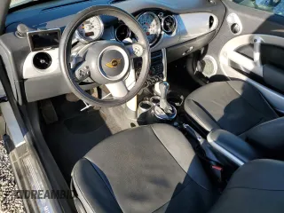 2008 MINI Convertible with VIN WMWRF33588TG18353, listed as a Copart auction lot 49401615 with 124,540 mi miles and Salvage Title. Bid and sale history available at DreamBid. Image 8.