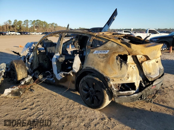 2024 Tesla Model Y with VIN 7SAYGDED6RA324943, listed as a Copart auction lot 43266965 with Not provided miles and Non repairable. Bid and sale history available at DreamBid. Image 2.