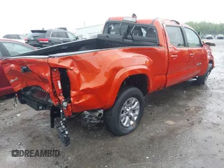 2017 Toyota Tacoma SR5 with VIN 5TFDZ5BN0HX015629, listed as a IAAI auction lot 42002103 with 127,829 mi miles. Bid and sale history available at carsss.com. Image 4.