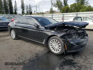 2018 BMW 7 Series 740i with VIN WBA7E2C59JB216290, listed as a Copart auction lot 89082215 with 56,020 mi miles and Salvage Title. Bid and sale history available at carsss.com. Image 4.