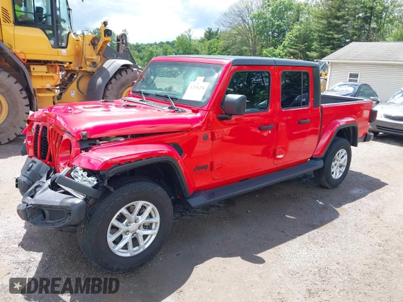 2023 Jeep Gladiator Sport S with VIN 1C6HJTAG8PL572270, listed as a IAAI auction lot 42336294 with 13,865 mi miles and . Bid and sale history available at DreamBid. Image 2.