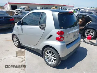 2008 Smart fortwo Pure with VIN WMEEJ31X68K106096, listed as a IAAI auction lot 42456471 with 92,074 mi miles and . Bid and sale history available at DreamBid. Image 3.