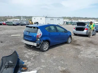 2014 Toyota Prius One with VIN JTDKDTB33E1565723, listed as a IAAI auction lot 42070826 with 145,811 mi miles and . Bid and sale history available at DreamBid. Image 4.